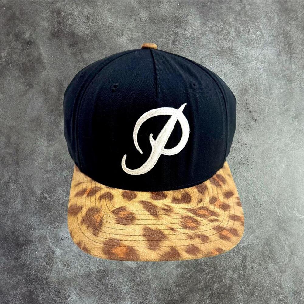 Primitive x Starter black and leopard print snapback cap.